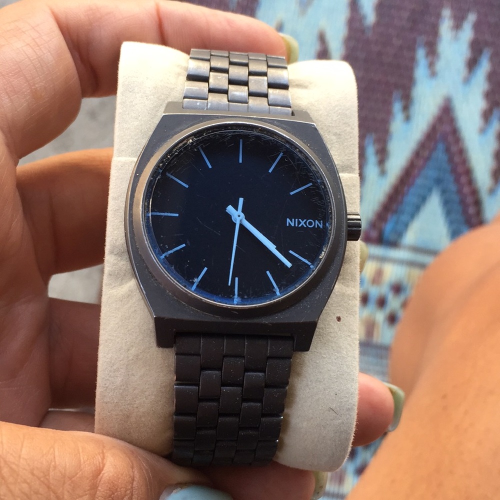Nixon charcoal grey , blue face